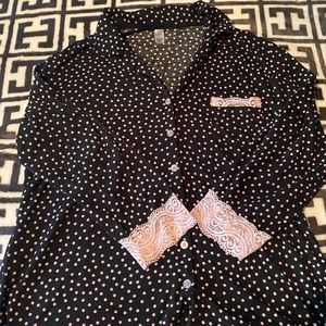 Cute pajama shirt it was a set but can’t find the pants :(.